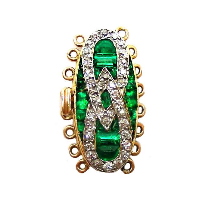 Early 20th century emerald and diamond oval cluster clasp, c.1915, with fittings for eight rows,